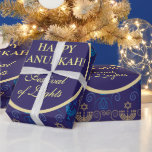 First Candle of Hanukkah Festival of Lights Party  Wrapping Paper<br><div class="desc">First Candle of Hanukkah. Happy Hanukkah Festival of lights party Wrapping Paper beauty Jewish holiday card. Beautiful Jewish Holiday Chanukah background with traditional Chanukah decorative symbols - wooden dreidels (spinning top), donuts, hanukkiah menorah, candles, star of David and glowing lights wallpaper gold hanukkiah navy blue pattern pattern. Hanukkah festival of...</div>