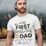 First Christmas as a dad - family matching cute T-Shirt<br><div class="desc">Show your joy for your very first Christmas as a dad with this lovely t-shirt decorated with a red Santa hat,  green holly leaves,  a golden ball,  a red heart,  and colorful Christmas lights.</div>