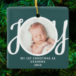 First Christmas As Grandma Photo Keepsake Green Ceramic Ornament<br><div class="desc">This keepsake "First Christmas As Grandma" photo ornament is decorated with the word 'JOY' in stylish script typography on a green background. Easily customizable.</div>