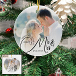 First Christmas as Mr and Mrs 2 Photo Black White Ceramic Ornament<br><div class="desc">Create your own custom personalized wedding photo keepsake ornament featuring one or two photos (one on each side), the title FIRST CHRISTMAS AS MR AND MRS in an elegant script typography with your last name and year in your choice of text colors (shown in black against a white ombre photo...</div>