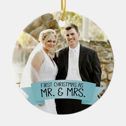 First Christmas as Mr. & Mrs. Photo Light Teal Ceramic Ornament - This photo Christmas tree ornament features photo frame to fill the front of the ornament. A graphic of a dusty blue ribbon banner, near the bottom, features the text: First Christmas as Mr. & Mrs. Custom text, on the back, allows you to add the names of the bride and groom and the year. This ornament is a perfect Christmas gift for the newlyweds.