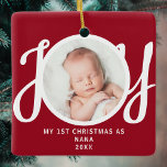 First Christmas As Nana Photo Keepsake Red  Ceramic Ornament<br><div class="desc">This keepsake "First Christmas As Nana" photo ornament is decorated with the word 'JOY' in stylish script typography on a red background. Easily customizable.</div>
