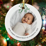 First Christmas As Parents Photo Mistletoe  Ceramic Ornament<br><div class="desc">This Parent's First Christmas Ornament is decorated with watercolor mistletoe.
Easily customizable with your baby's photo,  name,  and year.
Use the Design Tool to change the text size,  style,  or color.
Because we create our artwork you won't find this exact image from other designers.
Original Watercolor © Michele Davies.</div>