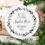 First Christmas Baby Photo Black White Ornament<br><div class="desc">This design features a black and white wreath of Christmas ornaments, holly berries and foliage, surrounding the words "My First Christmas" in whimsical black printing font. Customize the front with baby's name in handwriting script, along with the family name and year. Easily replace the sample photo on the reverse side...</div>