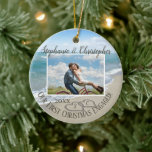 First Christmas Engaged Beach Hearts Couple Photo  Ceramic Ornament<br><div class="desc">First Christmas Engaged, beautiful beach themed photo engagement ornament! Celebrate your engagement while planning a beach wedding or honeymoon with this keepsake engagement ornament. Interlocking beach wedding hearts drawn in the sand makes an elegant tropical ocean coastal nautical theme wedding, matching set of items. Pretty turquoise water waves crashing on...</div>