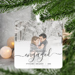 First Christmas Engaged Custom Photo Gray Script Ceramic Ornament<br><div class="desc">Commemorate your engagement with this beautiful modern keepsake ornament. The gray text reads "Our first Christmas engaged, " with the word "engaged" in elegant handwriting script with flourishes before and after. Replace the sample image with your favorite photo, and add your names and the year. A white gradient filter helps...</div>