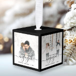 First Christmas Engaged Four Photo Black Script Cube Ornament<br><div class="desc">Commemorate your engagement with this beautiful modern keepsake ornament. The black text reads "Our first Christmas engaged, " with the word "engaged" in elegant handwriting script with flourishes before and after. The top, bottom and edges of the cube are a matching black. Replace the four sample images with your favorite...</div>