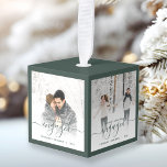 First Christmas Engaged Four Photo Green Script Cube Ornament<br><div class="desc">Commemorate your engagement with this beautiful modern keepsake ornament. The dark green text reads "Our first Christmas engaged, " with the word "engaged" in elegant handwriting script with flourishes before and after. The top, bottom and edges of the cube are a matching shade of dark green. Replace the four sample...</div>