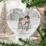 First Christmas Engaged Photo Gray Script Heart Ornament<br><div class="desc">Commemorate your engagement with this beautiful heart-shaped keepsake ornament. The gray text reads "Our first Christmas engaged, " with the word "engaged" in elegant handwriting script with flourishes before and after. Replace the sample image with your favorite photo, and add your names and the year. A white gradient filter helps...</div>