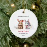 First Christmas engaged together bunnies Ceramic Ornament<br><div class="desc">Funny and cute Christmas ornament for all the happy couples. It features a couple of cute bunnies,  wearing Santa hats. Easy to personalize with your Name and Year</div>