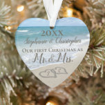First Christmas Heart Beach Wedding Mr Mrs Ornament<br><div class="desc">Pretty custom personalized heart shaped ornament to remember your first Christmas as Mr. and Mrs. Remember a beach wedding or honeymoon with this keepsake wedding ornament. First Christmas together with two interlocking beach wedding hearts drawn in the sand makes an elegant tropical ocean coastal nautical theme wedding, matching set of...</div>