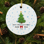 First Christmas Married 2024 Custom Couple  Ceramic Ornament<br><div class="desc">First Christmas Married 2024 Custom Couple Ceramic Ornament. Celebrate a couple's first Christmas as newlyweds with this beautifully designed ornament featuring a festive Christmas tree. The ornament is adorned with delicate snowflakes, a red ribbon, and the personalized names of the couple, along with the year 2024. Perfect for newly married...</div>