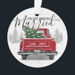 First Christmas Married Vintage Red Truck Photo  Ornament<br><div class="desc">This rustic themed ornament for newlyweds features a vintage red truck with a green Christmas tree in the back on a background of weathered wood. Above it reads "Our First Christmas Married" with your names and year on the truck to personalize. The back of the ornament has a photo for...</div>