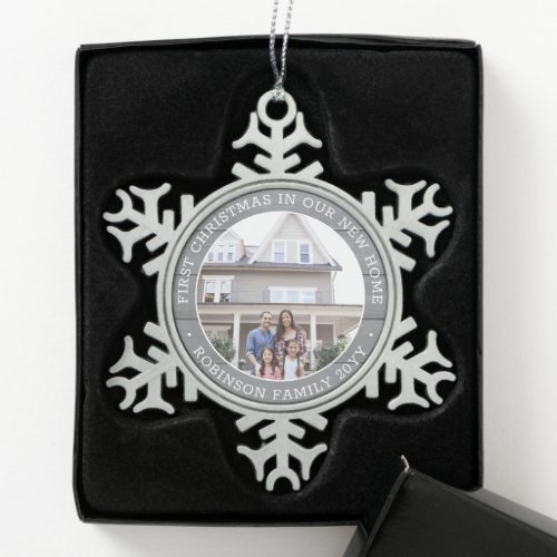 First Christmas New Home Photo Faux Gray Wood Snowflake Pewter Christmas Ornament - Celebrate the joy of your new place with a custom photo "First Christmas in our New Home" round metal snowflake ornament. Text and picture on this template are simple to personalize for any occasion. (IMAGE & TEXT DESIGN TIPS: 1) To adjust position of wording, add spaces at beginning or end. 2) To center the photo exactly how you want, crop it into a square shape before uploading to the Zazzle website.) Modern farmhouse style design features a rustic grey faux wood background, stylish typography name and year, and 1 image of your choice. This unique family keepsake adds an elegant touch to Xmas home decorations or makes a thoughtful housewarming realtor gift idea. There's no place like a new home for the holidays!