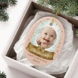 First Christmas Pink Baby Photo & Name Snow Globe Ceramic Ornament<br><div class="desc">Magical gold snow globe and gold magical stars baby's first Christmas photo keepsake ornament. Pink and gold baby's first Christmas snow globe photo keepsake ornament can be customized with the baby's name, the year, and one photo on the front and one on the back. Original hand-drawn artwork by Moodthology papery....</div>