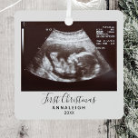First Christmas Pregnancy Ultrasound Announcement Metal Ornament<br><div class="desc">It's always a good time to share this exciting news with your nearest and dearest. Perfect Christmas gift idea for the grandma the rest of the family with an ultrasound photo ornament. Easily add the baby scan photo and a name by clicking the "Personalize" button Customize this unique announcement display,...</div>