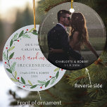 First Christmas Wreath Botanical Wedding Photo Ceramic Ornament<br><div class="desc">Capture the magic of your first Christmas as a married couple with this personalized ornament. The front showcases a beautiful botanical Christmas wreath, while the reverse features a heartwarming wedding photo that you can easily replace with your own special image. Customize the ornament with your last name, first names, and...</div>