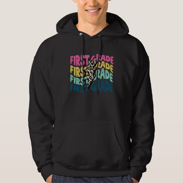 First Grade Leopard Lightning Bolt Teacher Back To Hoodie (Front)