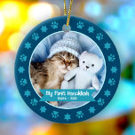 First Hanukkah Pet Kitten Photo Paws Stars Navy Ceramic Ornament<br><div class="desc">“My First Hanukkah.” Celebrate your new pet’s arrival this past year! A turquoise blue banner with your pet’s name and year in whimsical white typography overlays your kitten or puppy’s custom photo. A playful border of turquoise blue paw prints and Stars of David against navy blue surrounds it. Feel the...</div>