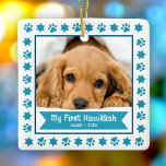 First Hanukkah Pet Puppy Photo Turquoise Paws Cute Ceramic Ornament<br><div class="desc">My First Hanukkah.” Celebrate your new pet’s arrival this past year! A turquoise blue banner with your pet’s name and year in whimsical white typography overlays your puppy or kitten’s custom photo. A playful border of turquoise blue paw prints and Stars of David against white surrounds it. Feel the warmth...</div>