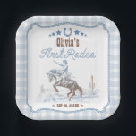 First Rodeo 1st Birthday Blue Western Paper Plates<br><div class="desc">Cherish your little cowboy's first-year milestones with our beautifully designed 'My First Rodeo' suite. The design features a retro vintage cowboy illustration set against a picturesque desert landscape with cacti, all highlighted by a blue plaid pattern. CUSTOMIZATION: If you need design customization, please get in touch with me via chat....</div>
