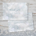 First Winter Snowflakes Wedding Thank You Card<br><div class="desc">First winter snowflakes thank you card. Gentle snowflakes fall across your wedding thank you message set on a magical winter background. This chic wedding thank you card can be personalised with your special thank you message and names. You can personalise with your own thank you message on the reverse or...</div>