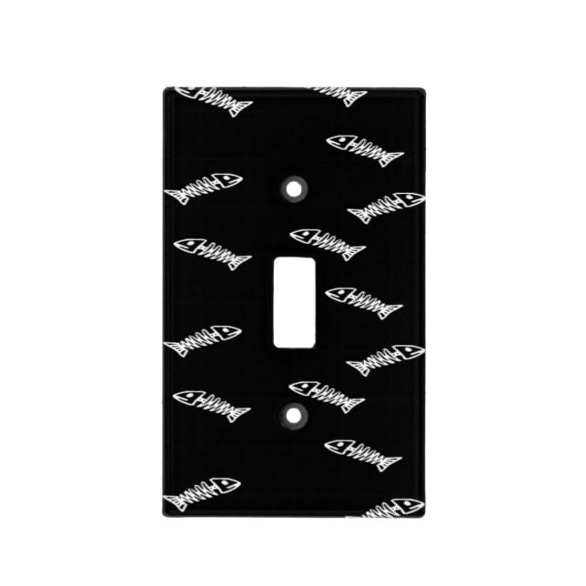 Fish skeleton on black light switch cover (Front)