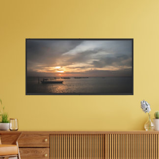 Fisherman at Sunset at the Beach Canvas Print