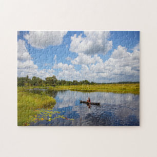 Fisherman on a lake in Guyana. Jigsaw Puzzle