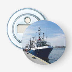 Fishing boat at mooring bottle opener