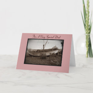 fishing boat lobster pots on pebble beach seaside card