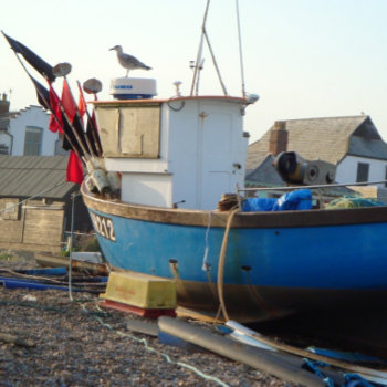 Fishing Boat Moored By The Sea Coastal Photo Jigsaw Puzzle by artoriginals at Zazzle