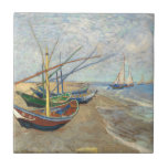 Fishing Boats on the Beach by Vincent Van Gogh  Ceramic Tile<br><div class="desc">Fishing Boats on the Beach at Les Saintes-Maries-de-la-Mer. Can you see why these fishermen's boats appear slightly unreal? Compared to the irregular surface of the sandy beach, they've been painted in an overly two-dimensional way. The boats are made up of areas of uniform color within strong outlines. Furthermore, the boats...</div>