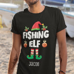 Fishing elf family matching christmas with name T-Shirt<br><div class="desc">Get into the holiday spirit with this fun Fishing elf t-shirt which is part of a matching family elf outfit collection containing gifts for any family member. Perfect for any Christmas family reunion, this t-shirt features a cute elf hat and fun legs, with the caption "Fishing elf" in a white...</div>