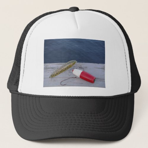 fishing lures at the lake red white blue trucker hat