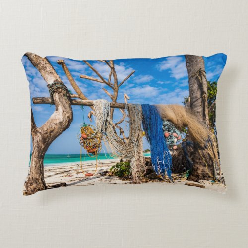 Fishing nets drying on the beach accent pillow