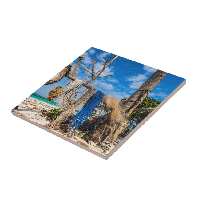 Fishing nets drying on the beach ceramic tile (Side)
