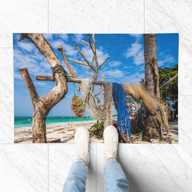 Fishing nets drying on the beach doormat (Indoor)