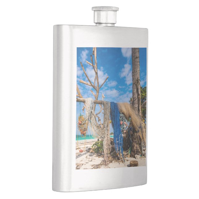 Fishing nets drying on the beach flask (Right)