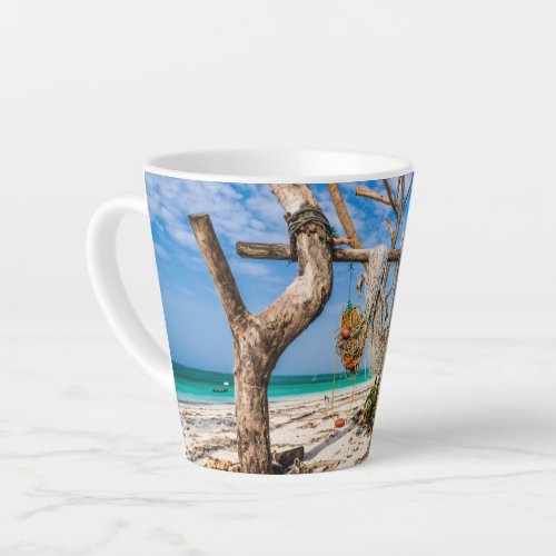 Fishing nets drying on the beach latte mug