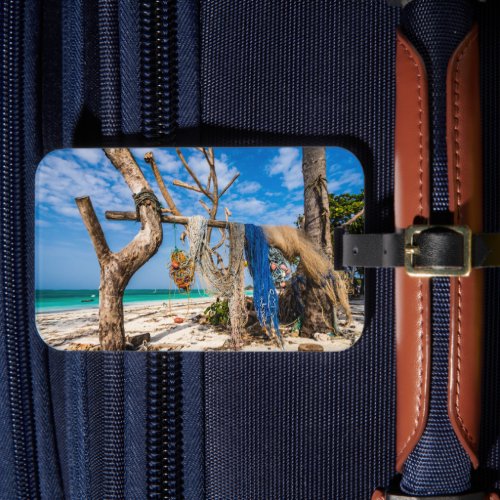 Fishing nets drying on the beach luggage tag