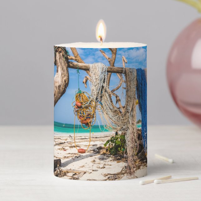 Fishing nets drying on the beach pillar candle (In Situ)