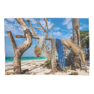 Fishing nets drying on the beach pillow case