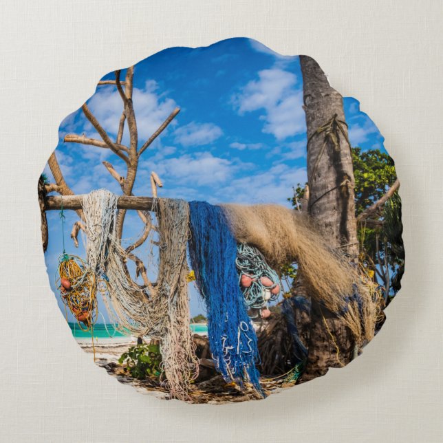 Fishing nets drying on the beach round pillow (Back)