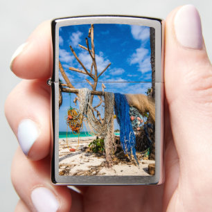 Fishing nets drying on the beach Zippo Lighter