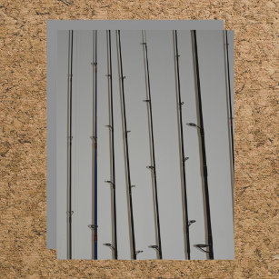 Fishing Rods aligned on Gray Scrapbook Paper
