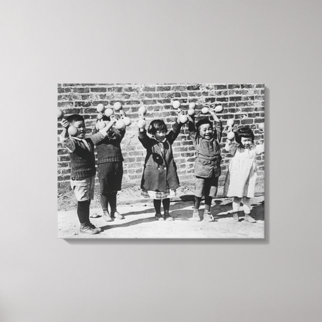 Five Asian Children holding up Barbells Canvas Print (Front)