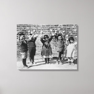 Five Asian Children holding up Barbells Canvas Print