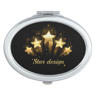 Five gold stars on black compact mirror