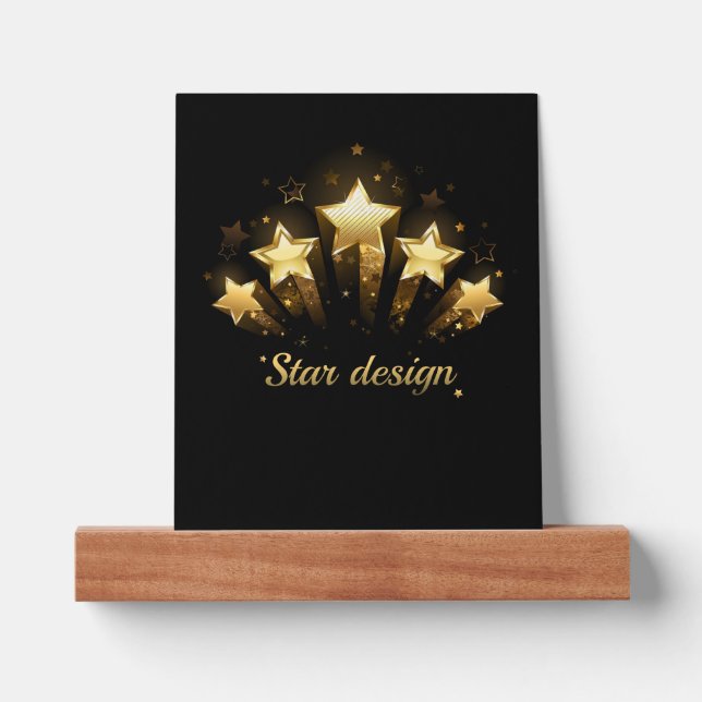 Five gold stars on black picture ledge (Front)